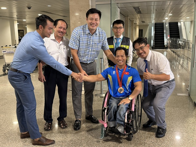 Ngày về của các tuyển thủ Paralympic Việt Nam- Ảnh 2.